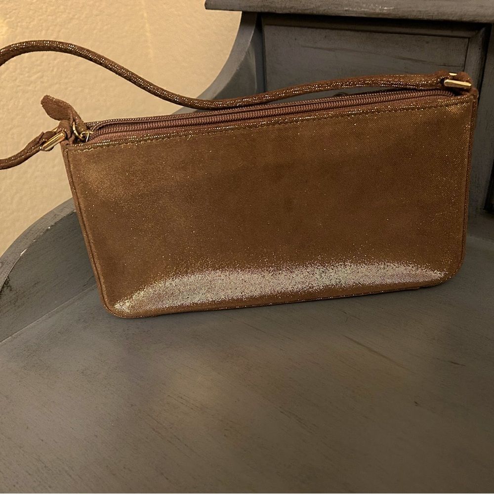 Adrienne Vittadini gold shimmery bag in excellent condition with storage bag